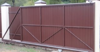 Купить откатные ворота из профнастила Уссурийск, цена от 1763 руб.